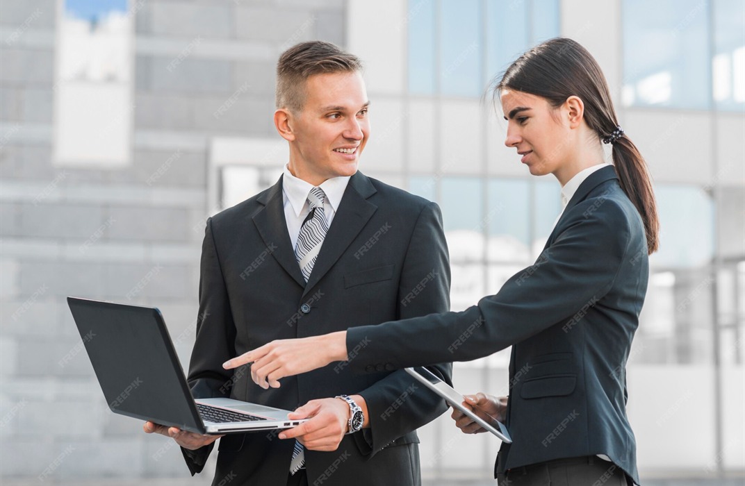 Recruitment specialists collaborating on hiring strategy